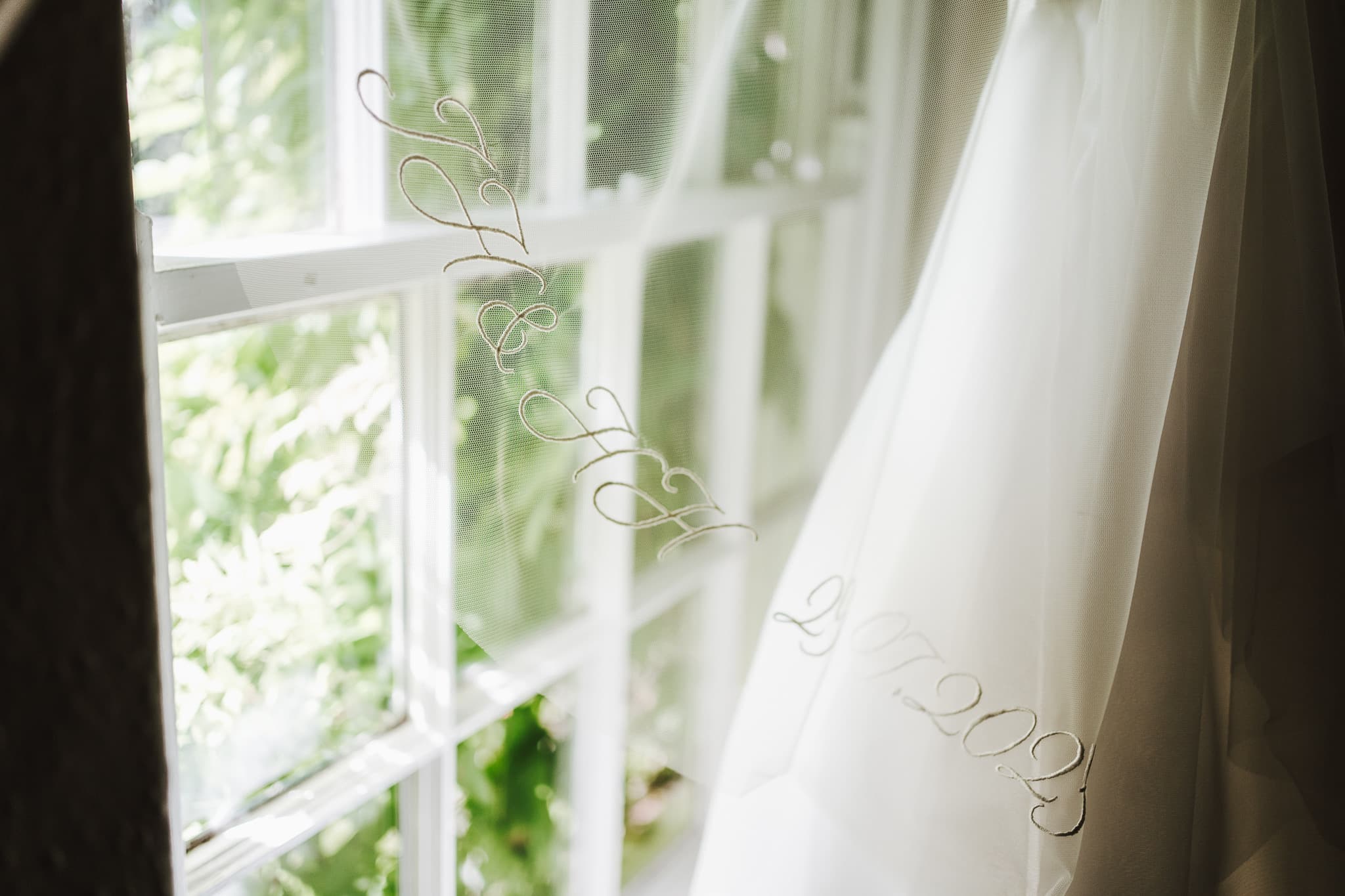 Embroidered veil with the brides wedding date and initials